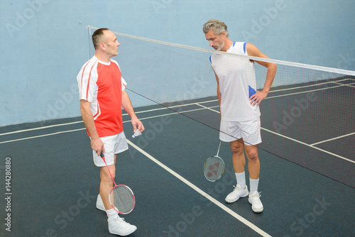 Man in discussion during badminton game