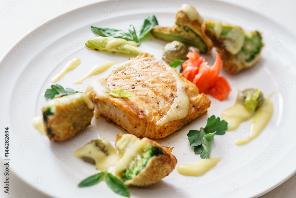 salmon steak with vegetables