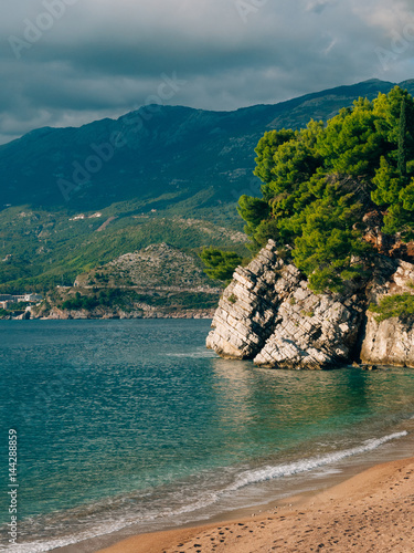Rocks on the sea in Montenegro. Rocky coast. Wild beach. Dangerous coast.