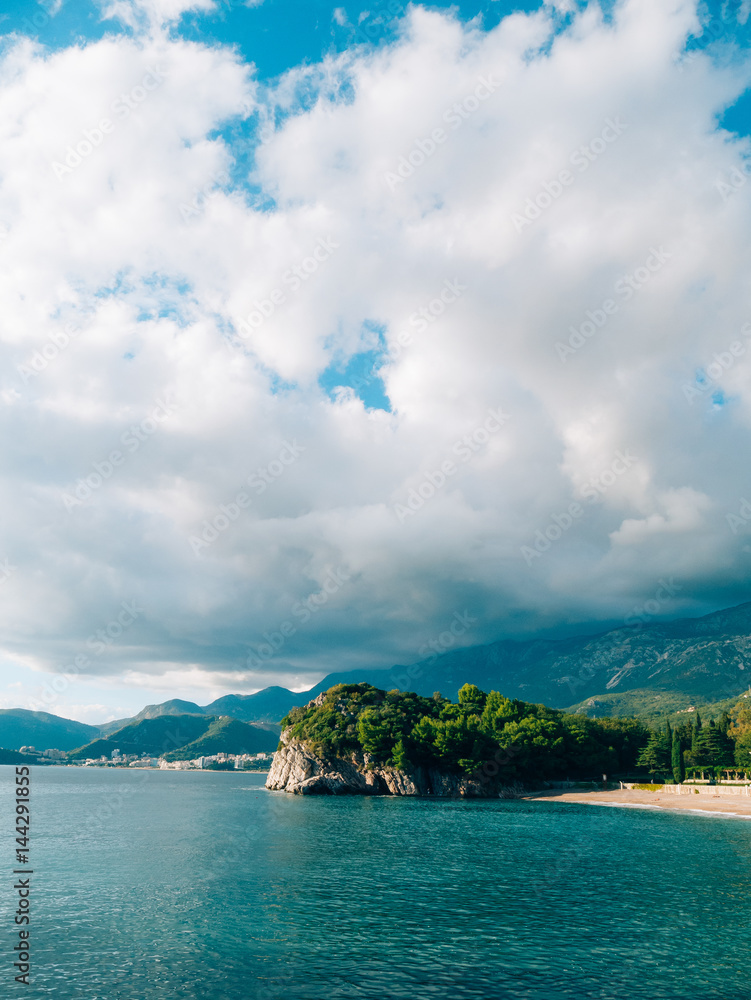 Private beach of the hotel Sveti Stefan, near the island. Montenegro, the Adriatic Sea.
