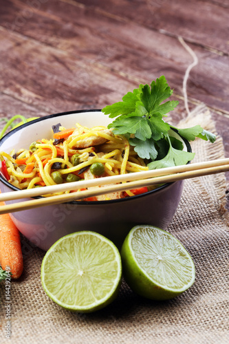 Traditional indonesian meal bami goreng with noodles, vegetables