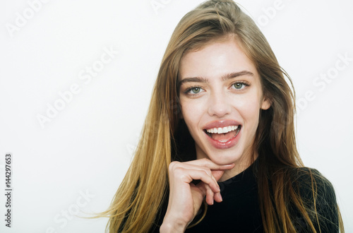 Happy pretty girl with long blond hair