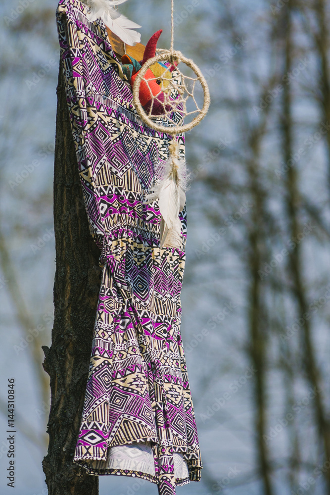 On the tree hanging dreamcatcher and a woman's dress. Indie style Stock  Photo | Adobe Stock