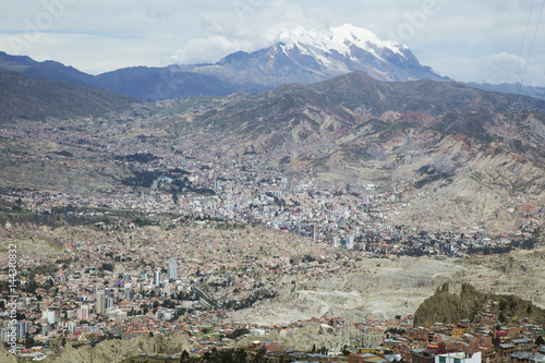 Aerial view of La Paz city in Bolivia and the Illimani mountain in the background