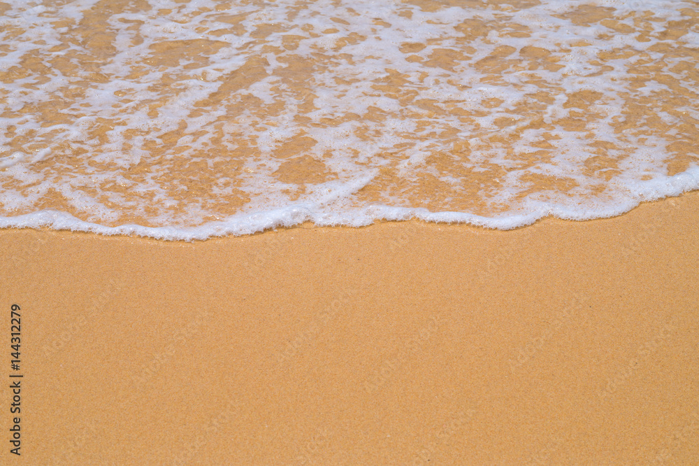 Beach yellow sand covered with wave white foam background. Beach yellow sand covered with wave white foam background.