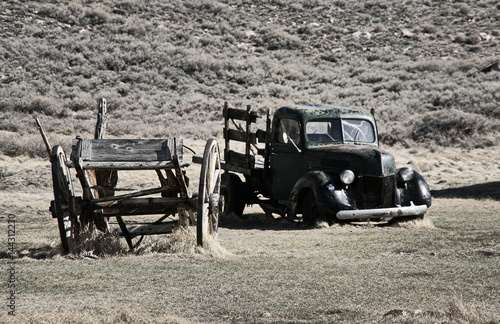 Wreck of cart and pick up in the ghost town of Bodie - California photo