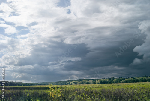 Strong storm clouds over the valley photo