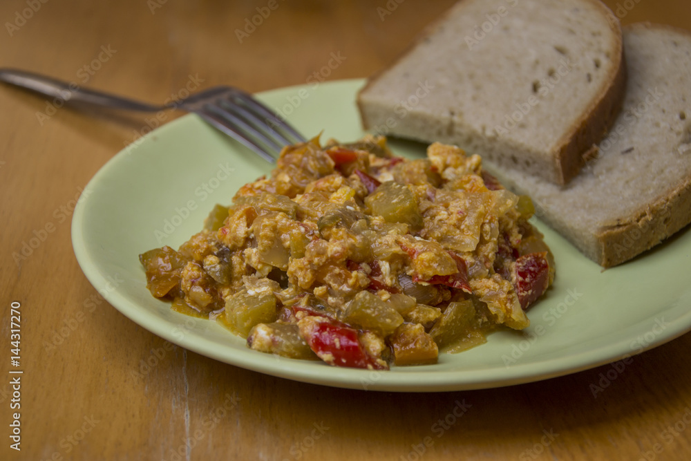 homemade lecho, hungaria tradition food with bread and spoon homemade lecho, hungaria tradition food with bread and spoon