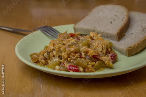 homemade lecho, hungaria tradition food with bread and spoon