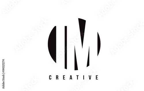 TM T M White Letter Logo Design with Circle Background.