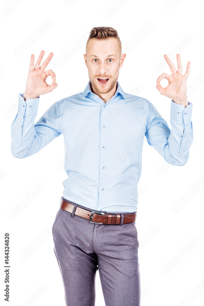 businessman showing OK while standing against white background businessman showing OK while standing against white background