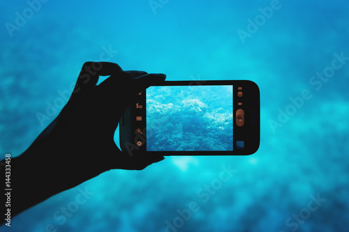 photographing with a smartphone in the red sea