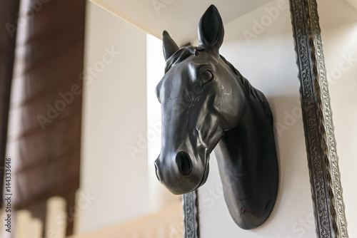 Close up horse head on wall used for decoration photo