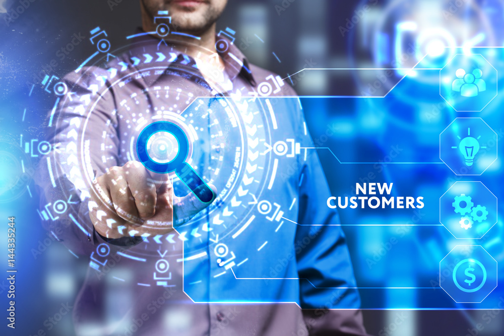 Business, Technology, Internet and network concept. Young businessman working on a virtual screen of the future and sees the inscription: New customers Business, Technology, Internet and network concept. Young businessman working on a virtual screen of the future and sees the inscription: New customers