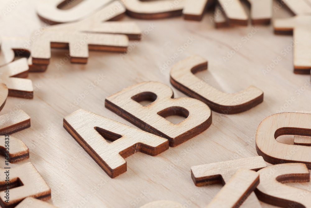 Back to school concept. Alphabet made of wooden letters Back to school concept. Alphabet made of wooden letters
