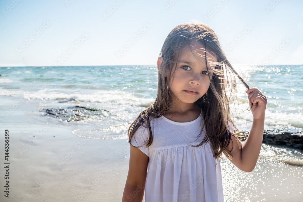 Happy little girl on the beach Happy little girl on the beach