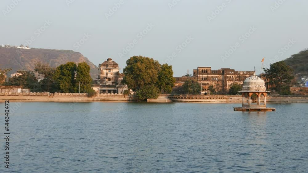 Bundi cityscape with the majestic palace and walls reflecting on water pond, travel destination in Rajasthan, India. Bundi cityscape with the majestic palace and walls reflecting on water pond, travel destination in Rajasthan, India.