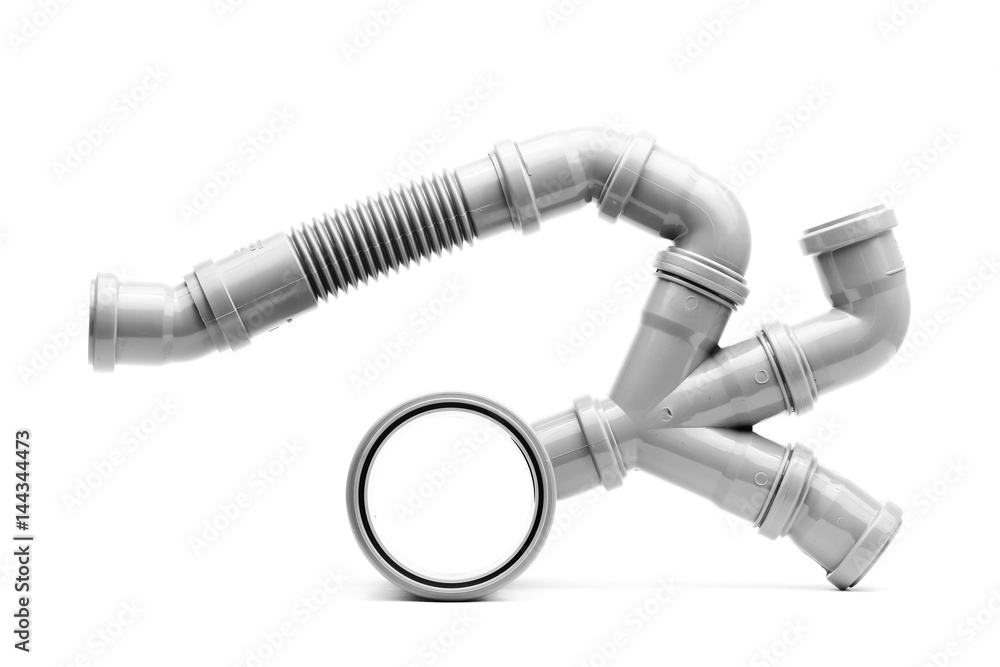 New grey drain pvc pipe fitting isolated on white New grey drain pvc pipe fitting isolated on white