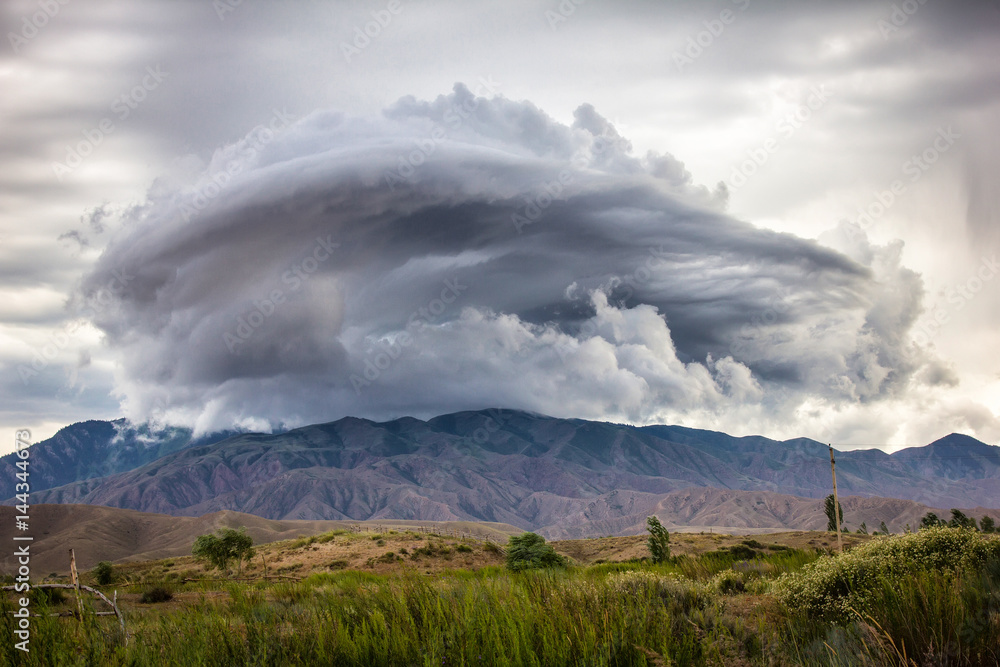 Lenticular cloud over the mountains of Tienshan