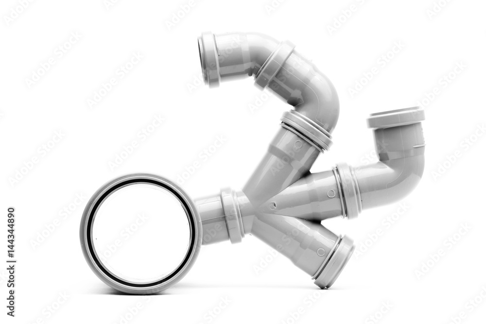 New grey drain pvc pipe fitting isolated on white New grey drain pvc pipe fitting isolated on white