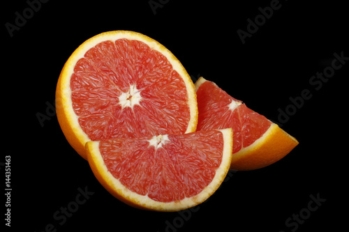 red orange slices isolated on black background