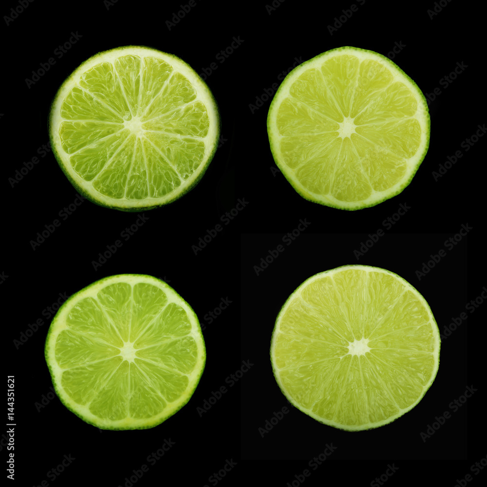 lime slices on black background isolated lime slices on black background isolated