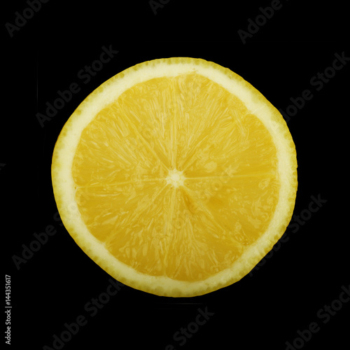 lemon slice on black isolated