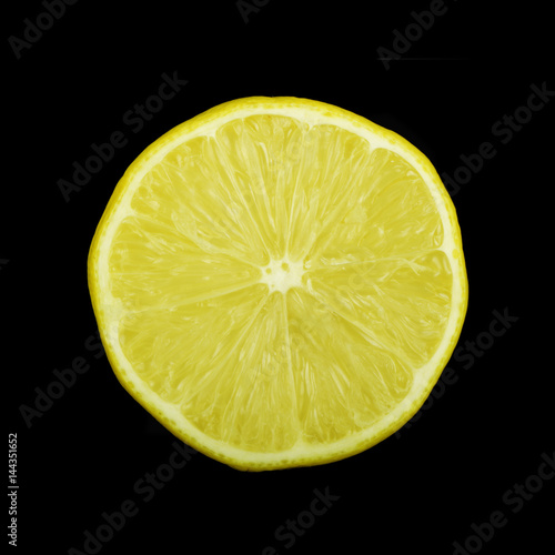 lemon slice on black isolated