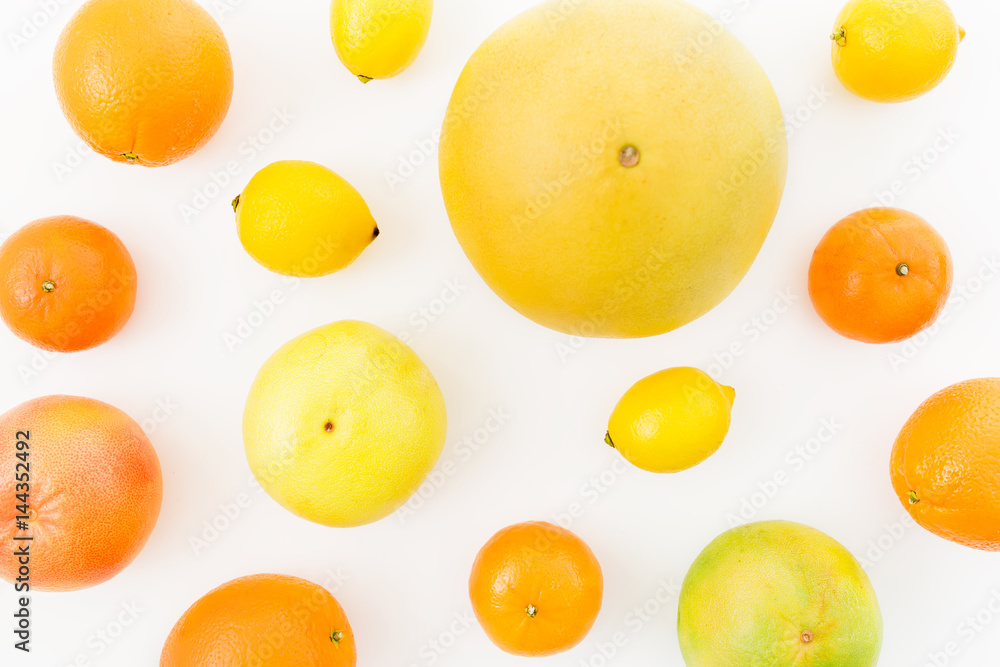 Fruit background. Citrus fruits on white background. Flat lay, top view. Fruit background. Citrus fruits on white background. Flat lay, top view.