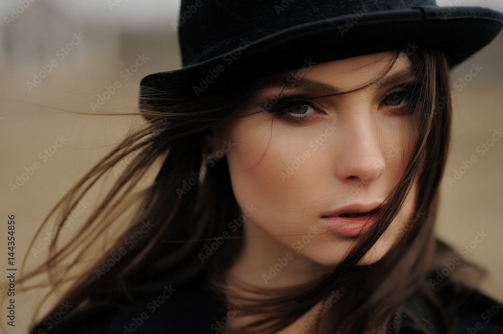 portrait of beautiful girl with magic eyes in a hat portrait of beautiful girl with magic eyes in a hat