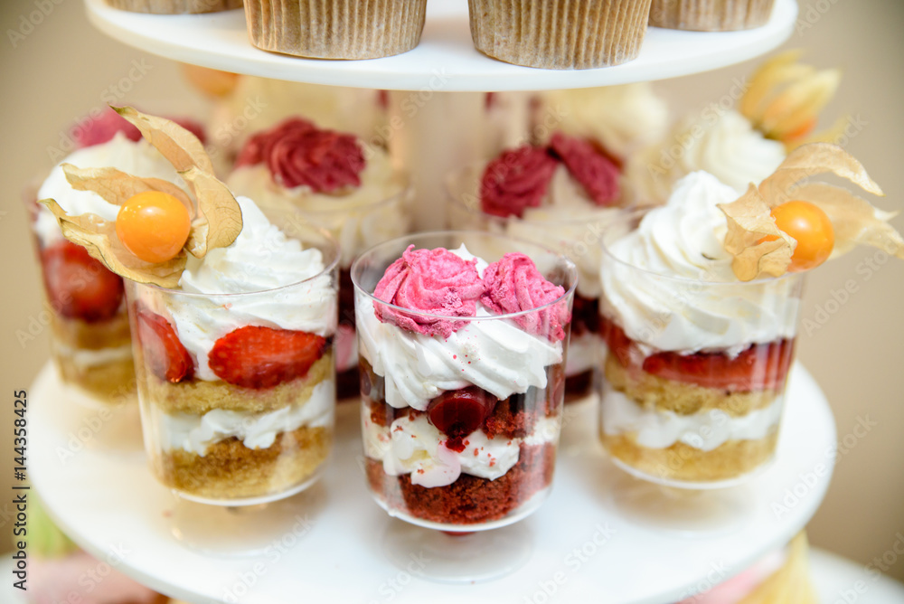Multi-colored cream cup cakes Multi-colored cream cup cakes