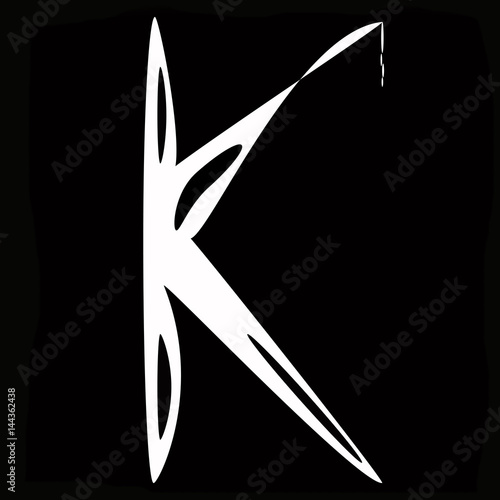 The letter K on a black background