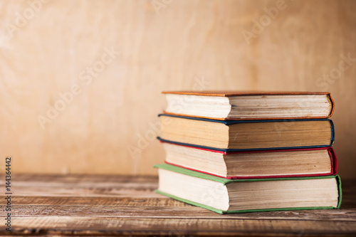 Books on the wooden table  old books