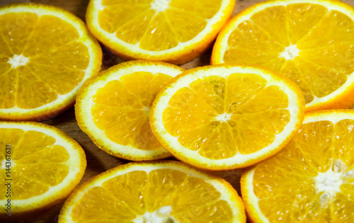 Background of sliced juicy oranges fruit