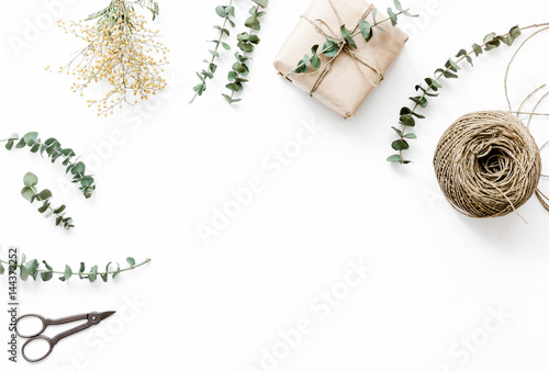 wrapping gifts concept for holiday on white background top view mock up