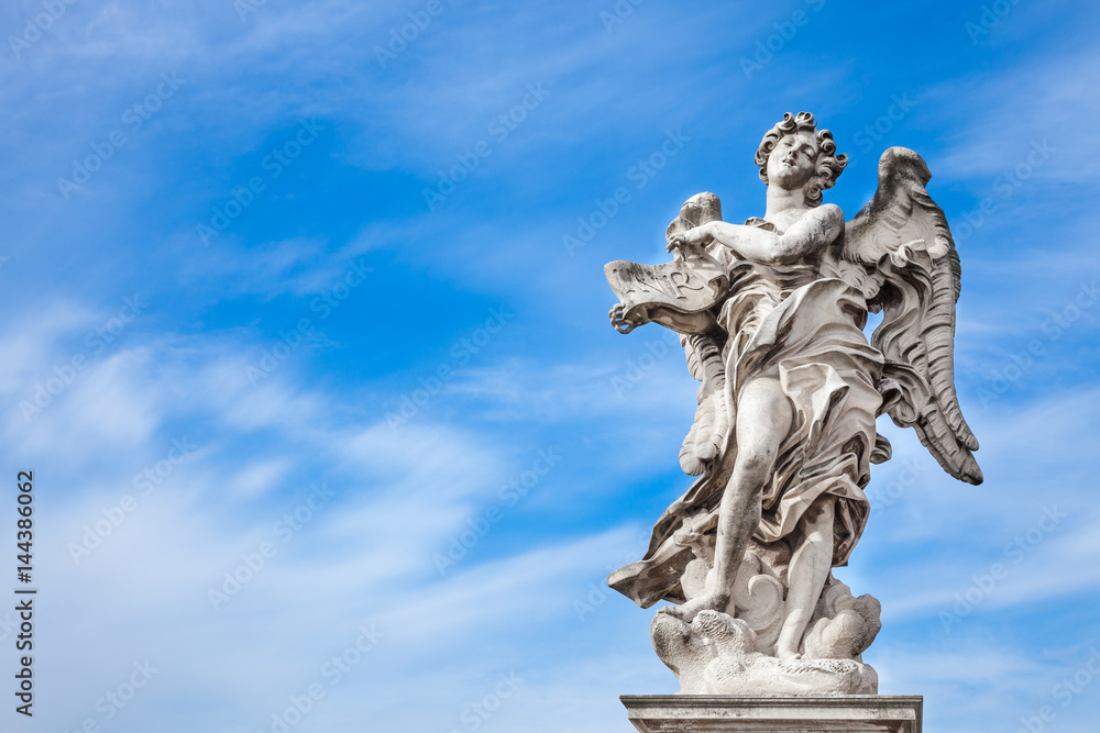 Angel statue along Sant'Angelo bridge in Rome. the bridge leading to Rome Castel Sant'Angelo is adorned with ten beautiful Baroque statues of angels