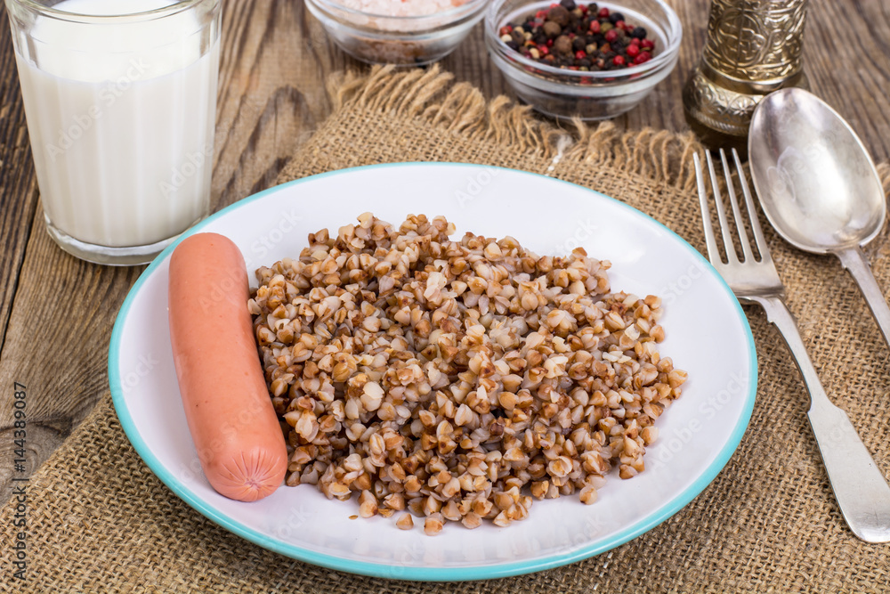 Sausage with garnish of buckwheat Sausage with garnish of buckwheat