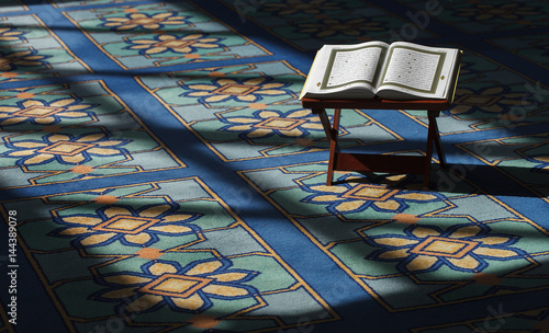 Photos Quran - the holy islamic book on the lauh in the Malaysian mosque