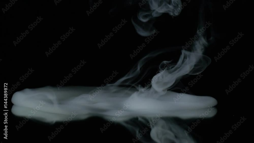 Milky, thick smoke, slowly spreading through the mirror Milky, thick smoke, slowly spreading through the mirror
