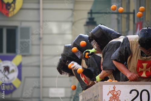 Historical battle of the oranges during Ivrea's carnival. Ivrea, Piemonte, Italy photo