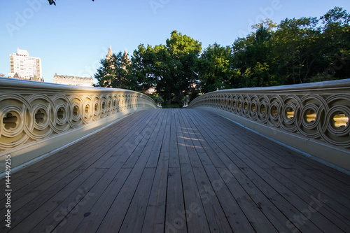 Wooden walkway of Bow bridge at Central Park