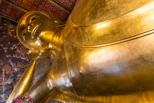 Reclining golden Buddha statue in Wat Pho, Banngkok, Thailand