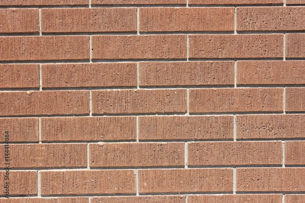 Obraz premium a wall of brown bricks
