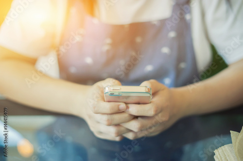 businesswoman working with modern devices, student girl using digital tablet computer and mobile smart phone,business concept,selective focus,vintage color