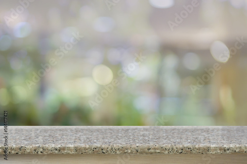 Empty top of natural granite stone,marble table with Abstract background Bokeh, mirror vintage effect. can use for product display advertising