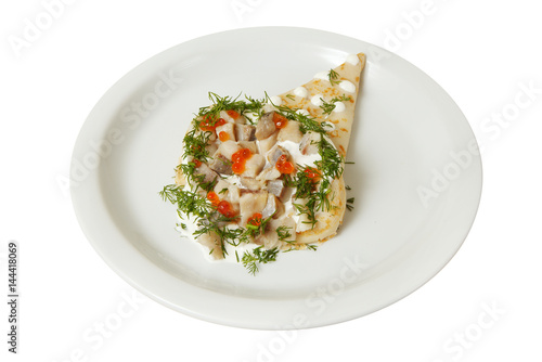Pancake with red caviar, sliced fish, dill, sour cream and parmesan cheese. Isolated on a white background