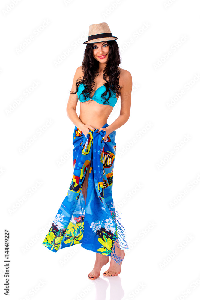 Full length portrait of young girl wearing blue bikini in rug and bonnet