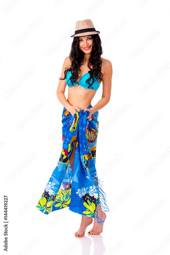 Full length portrait of young girl wearing blue bikini in rug and bonnet Full length portrait of young girl wearing blue bikini in rug and bonnet