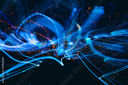 Slika na platnu Abstract colorful light painting on black background