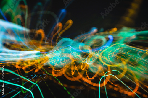 Abstract colorful light painting on black background